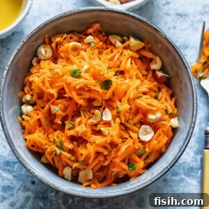 Vibrant French Carrot Salad with Toasted Hazelnut Crumble 6 Top down shot of french carrot salad in a small bowl