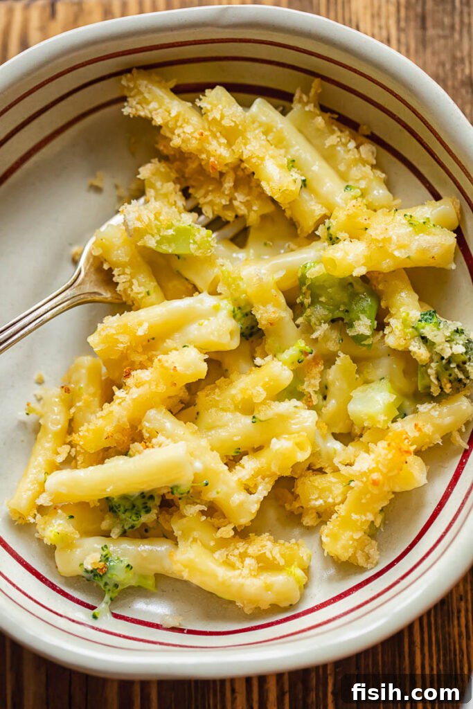 Golden Broccoli Mac Casserole 3 Shot of baked broccoli mac and cheese in a bowl