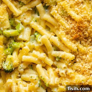 Close up shot of broccoli mac and cheese topped with breadcrumbs