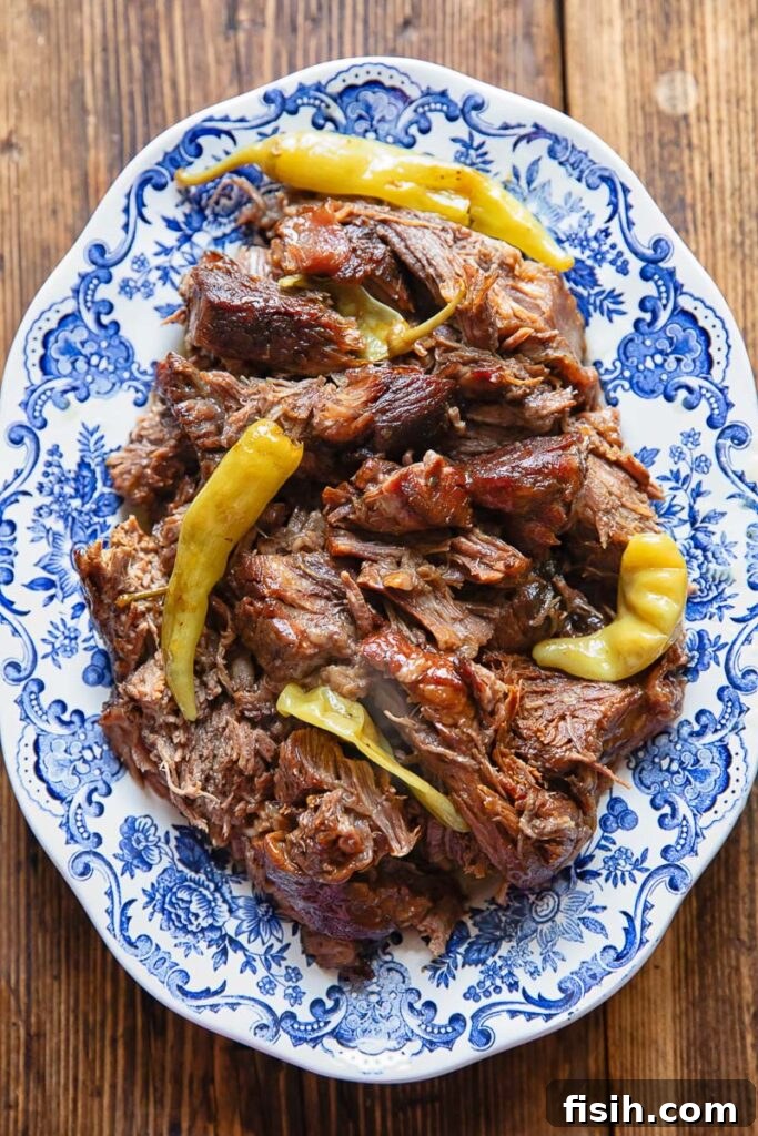 Melt-in-Your-Mouth Mississippi Pot Roast 2 Top down of slow cooked pot roast on a platter