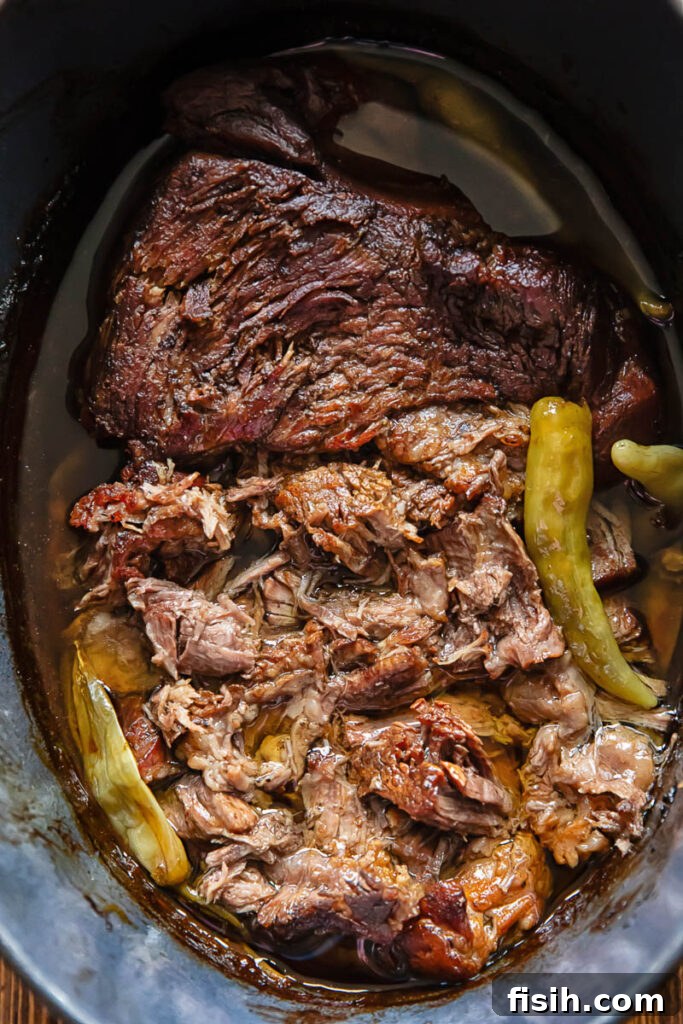 Melt-in-Your-Mouth Mississippi Pot Roast 4 Close up of pot roast in a slow cooker