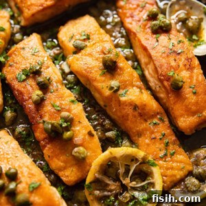 11 Vibrant Salmon Recipes Perfect for Sunny Days 9 Pan-seared salmon piccata topped with a lemon butter sauce, capers, and fresh parsley.