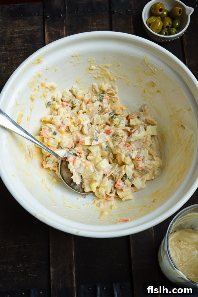 Top down shot of ensaladilla rusa in a large bowl