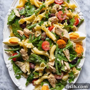 Mediterranean Tuna Nicoise Pasta Salad with Olives 5 Top down shot of Nicoise pasta salad on a serving platter