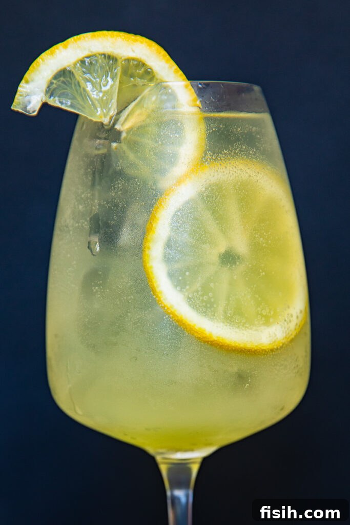 limoncello spritz cocktail with lemon garnish