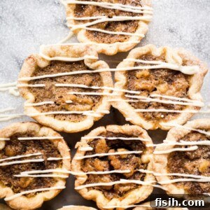 Maple Butter tarts drizzled with white chocolate